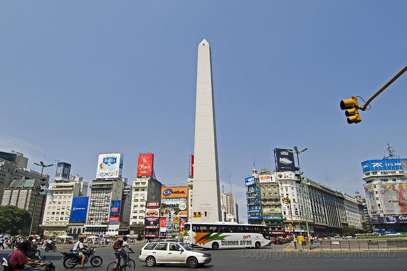 20071203_144627  D2X 4000x2667.jpg - Obelisk on Avenue 9 del Julio, Buenos Aires. Built in 1936 to commemorate the 400th anniversay of the city,  It was restored with a Paris hue exterior in 2005.  Its the site of national celebrations and a symbol of the city, but is not very impressive when viewed in person